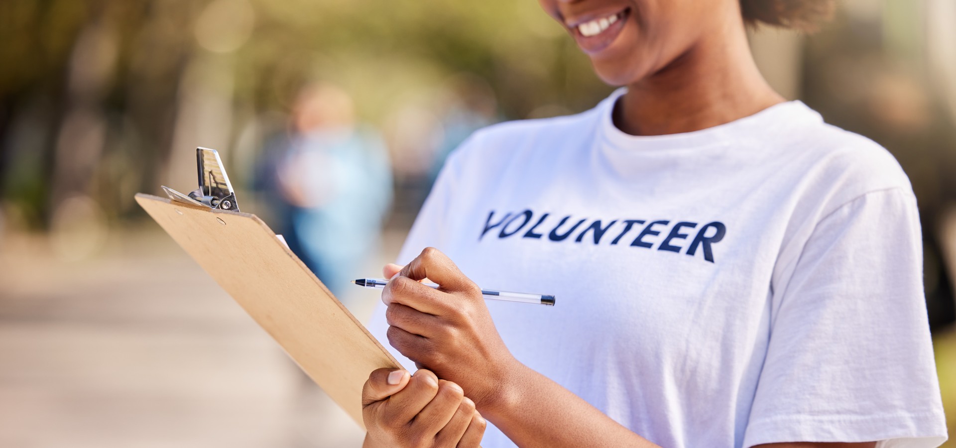 Woman wearing volunteer tshirt