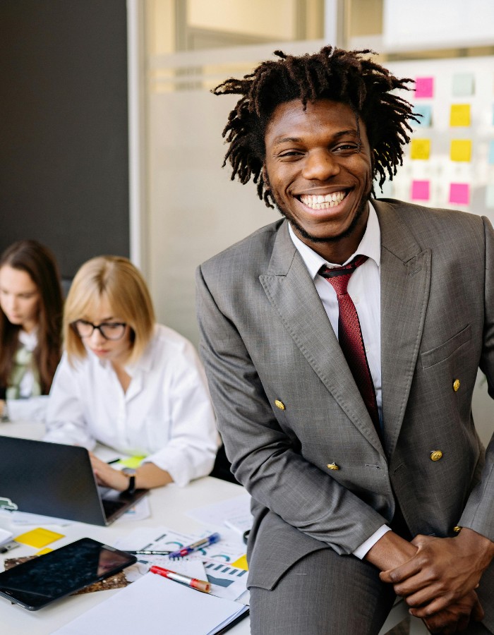 Young black man participating in mock client financial meeting